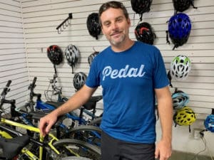 Aaron Hutchins in his St. Croix bike shop. Anne Salafia photo)