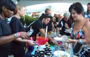 Foodies flock to a tasting table at the 2015 Taste of St. Croix.