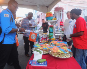 Taste of St. Croix judges check the fare of Nauti Bar and Grill.