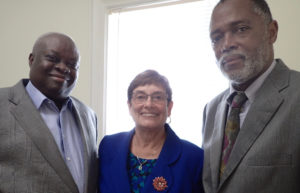 Gov. Kenneth Mapp with new PFA trustees Dorothy Isaac and Jackwrel Wallace.