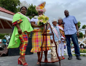 From left, Miss St. Croix Festival Queen Rachelle JnBaptiste, honoree Patricia Lynch Irvin, Festival Prince and Princess, Brandin Julien and K'aisa O' Bryan, and Lt. Gov. Osbert Potter. Irvin was presented with a ';whatnot table,' corsage and other gifts. (Anne Salafia photo)
