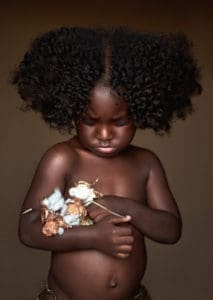 Photographer Emmanuel Phillips saw his two-year-old nephew playing with a cotton ball, and it prompted both this photo, 'Cotton,' and a rumination on context.