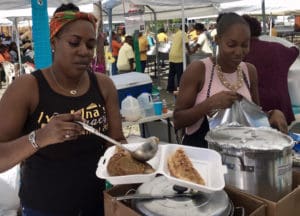 At the 2019 Folklife Festival, twins Luciah Polius and Loreli Hedrington serve up food as their grandmother and great aunt did for 20 years. (Source file photo)