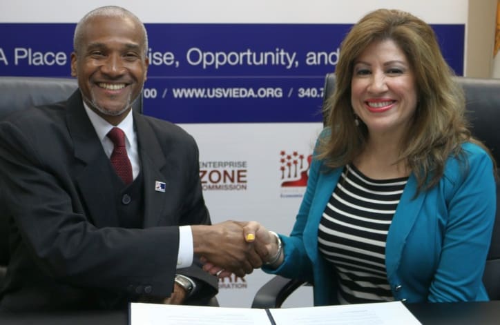 V.I. EDA Chief Executive Officer Kamal Latham and SBA District Director Yvette Collazo make official a two-year partnership that starts with the development of a strategic plan for local small business development.