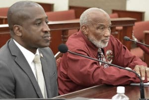 Patrick Farrell, executive director Office of Veterans Affairs, and Levron Sarauw, acting director Taxicab Commission testify on the medallion bill. (Photo ny Barry Leerdam for the V.I. Legislature)