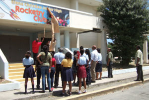 The rocketry club from Elena Christian watches a banner being hung at the school before it closed in 2015. (File photo by Susan Ellis)