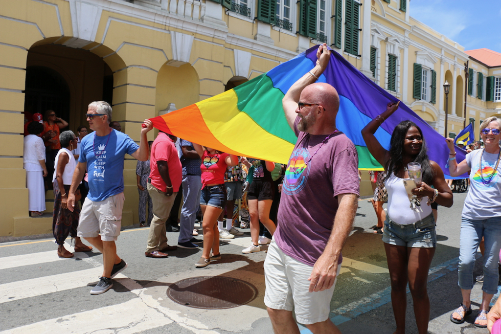 The 2019 St. Croix Pride Parade finished with a large rainbow banner proudly displayed by multiple participants. (Linda Morland photo)