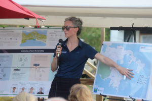 Becky Tharp, water quality program manager for Watershed Consulting Associates, addresses Tuesday's crowd.