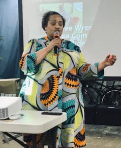 Mary Elliott, Curator National Museum of African American History and Culture, addresses the audience at the Guinea Warehouse. (Source photo by Elisa McKay)