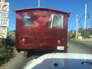 A safari shows damaged rear windows from a crash. (Facebook photo)