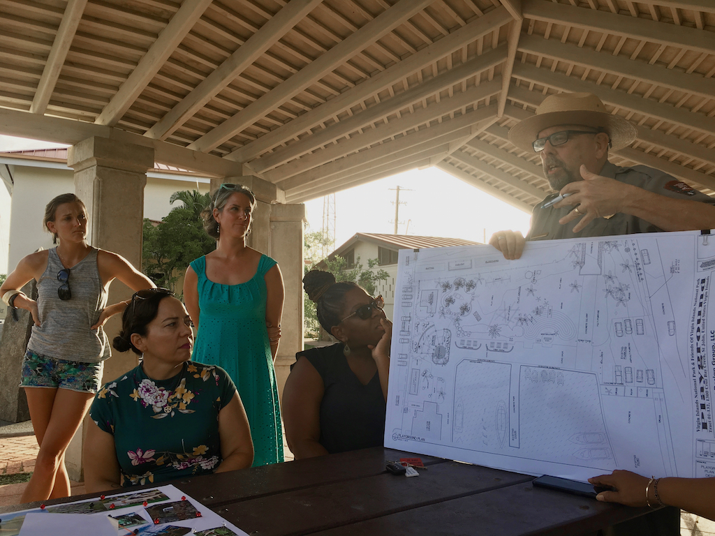 VINP Ranger Dave Worthington explains a drawing of the plans while Chelsea Baraowski and Tonia Lovejoy,, standing, and Zarah Rose and Crystal George, seated, look on. (Source photo by Amy Roberts)