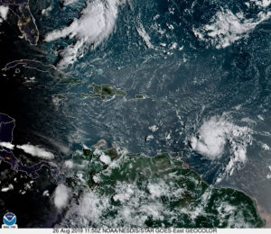 Satellite photo at 5 a.m. shows the outer arms of Tropical Storm Dorian, lower right, brushing up against Barbados. (NOAA photo)