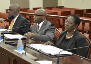 From left, USVI Housing Finance Authority Chief Operating Officer Darin Richardson, Executive Director Daryl Griffith, and Chief Financial Officer Valdez Shelford testify before the Senate Finance Committee. (Photo by Barry Leerdam, USVI Legislature)
