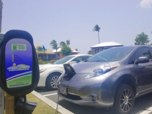 A Nissan Leaf at a charging station enjoys free power beachfront at Margaritaville. (Photo provided by St. Thomas Drive Electric day organizers)