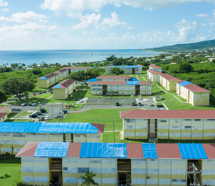 Federal funding has been appropriated to help repair public housing such as the Walter I.M. Hodge public housing neighborhood on St. Croix, which still shows extensive damage two years after the hurricanes of 2017. (Aerial photo by Daryl Wade)