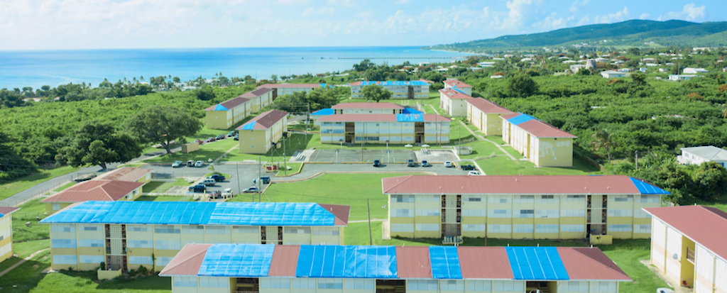 Federal funding has been appropriated to help repair public housing such as the Walter I.M. Hodge public housing neighborhood on St. Croix, which still shows extensive damage two years after the hurricanes of 2017. (Aerial photo by Daryl Wade)