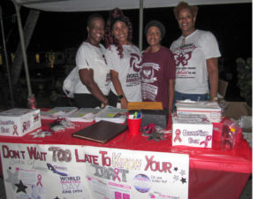 From left: Estellita Penn, Zaida Caban, Aniece Evans, and Stacie Penn collect filled out raffle tickets at the sickle cell fundraiser. (Source photo by Raven Phillips)