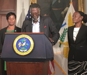 Agriculture commissioner Positive T.A. Nelson introduces Deputy Commissioner Khadija Blyden, left, and Assistant Commissioner Dianna Callwood. (Source photo by Susan Ellis)
