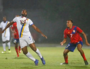 Kassall Greene controls the ball for the Virgin Islands in a recent loss against the Cayman Islands.