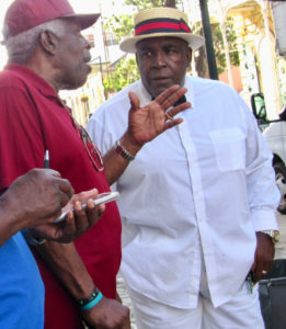 The late Carnival Committee Chairman Kenneth Blake chats with Village Committee Chairman Edgar Baker Philips at an event in 2018. Blake died Nov. 1 in Florida. (File photo)