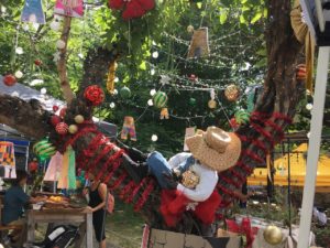 One of the decorated trees in Limpricht cradles a sleeping cowboy. (Source photo by Susan Ellis)