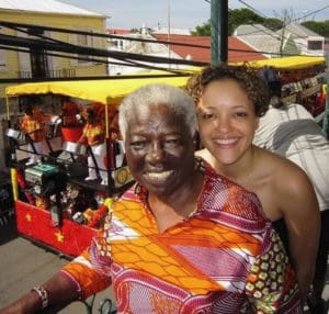 Ann Abramson and her granddaughter Rhea watch a parade pass by in Frederiksted. (Photo submitted by family)