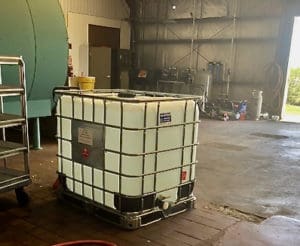 A 280 gallon container of breadfruit sanitizer. (Source photo by Susan Ellis)