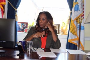 Delegate Stacey Plaskett (D-VI) on the phone in her Washington D.C. office speaking with reporters in March 2020. (File photo provided by Delegate Stacey Plaskett's office)