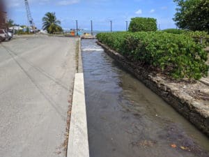 A seawater wave inundates a drainage gut in Christiansted. (Photo submitted by Hilary Lohmann, DPNR, and Greg Guannel, UVI)