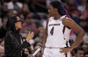 Aliyah Boston listens to AP Coach of the Year Dawn Staley. (Photo by South Carolina Athletic Department)