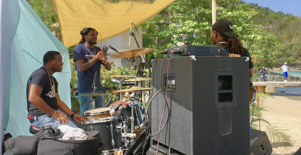 Musicians including Swanks on keyboard, Bugz on vocals, Mic Love on vocals, Rainman on bass and Drive King on drums played from 6 to 11 a.m. to a live audience of fish, seagulls, and visitors on a dozen sailboats. (Source photo by Amy H. Roberts)