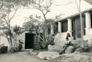Helen Randall and child on the steps of the house on Lameshur. (Photo from National Park Service archive)