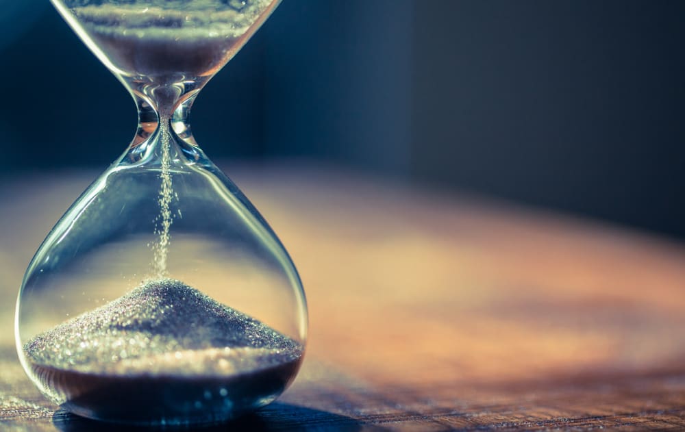 Sand running through an hourglass. (Shutterstock photo)