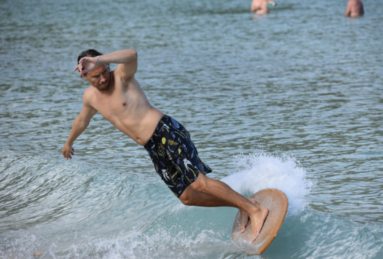 Breaking Dawn: A Skimboarder Wakes Up with the Waves