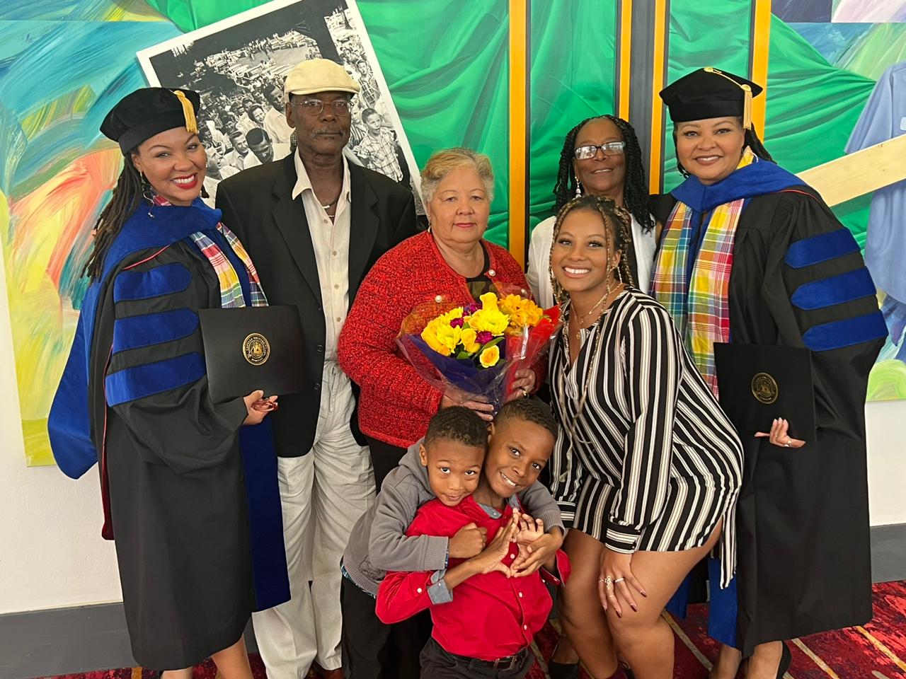The Simmonds Sisters’ doctoral hooding ceremony was attended by El’Roy Simmonds (father), Carmen Simmonds (mother), Emmeline Simmonds (Aunt), Xauskya Simmonds-Emmanuel (Xaulanda’s Daughter) and Taino Khing and Khnum Xau (Khnuma’s sons). (Submitted photo)