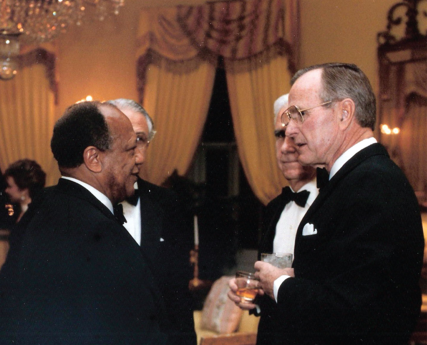 Ambassador Terence Todman attends a White House reception with President George H. W. Bush. (Photo courtesy James Dandridge II)