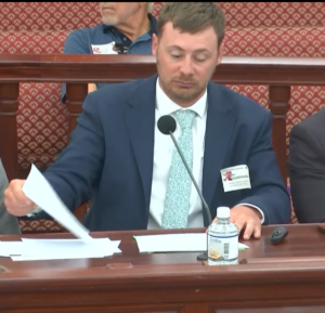 Ari Goldschneider testifies at Senate session Wednesday in a request for a zoning variance. (Image from Senate Committee of the Whole session Wednesday)