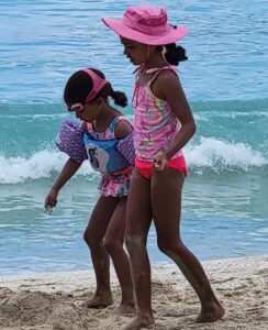 Granddaughters Stella and Clara Voigt enjoying the beach where Mac played with them. (Source photo by Shaun A. Pennington)