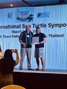 From left, Dr. Paul Jobsis, sea turtle biologist and director of research at The Hawksbill Project and Scott Eanes, founder of The Hawksbill Project accept the Champions Award at the International Sea Turtle Symposium in Pattaya, Thailand. (Photo courtesy Scott Eanes)