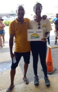 Nick Drayton and Cathy Prince welcome fellow members of the St. Croix Hiking Association outside the airport in Belize with a big sign that said, “GONE BUSH St. Croix Hiking Association." (Photo by Olasee Davis)