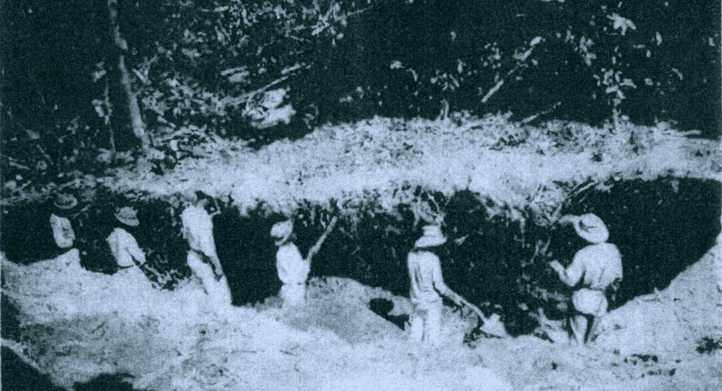 Workers excavate a pre-historic deposit site at Magens Bay in 1918. (Photo by Theodoor DeBooy and John T. Faris)