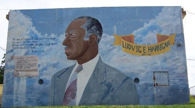 A mural paying tribute to Ludvig E. Harrigan on Building 9 of the housing community that bore his name. (Photo by Jorge Rodriguez)