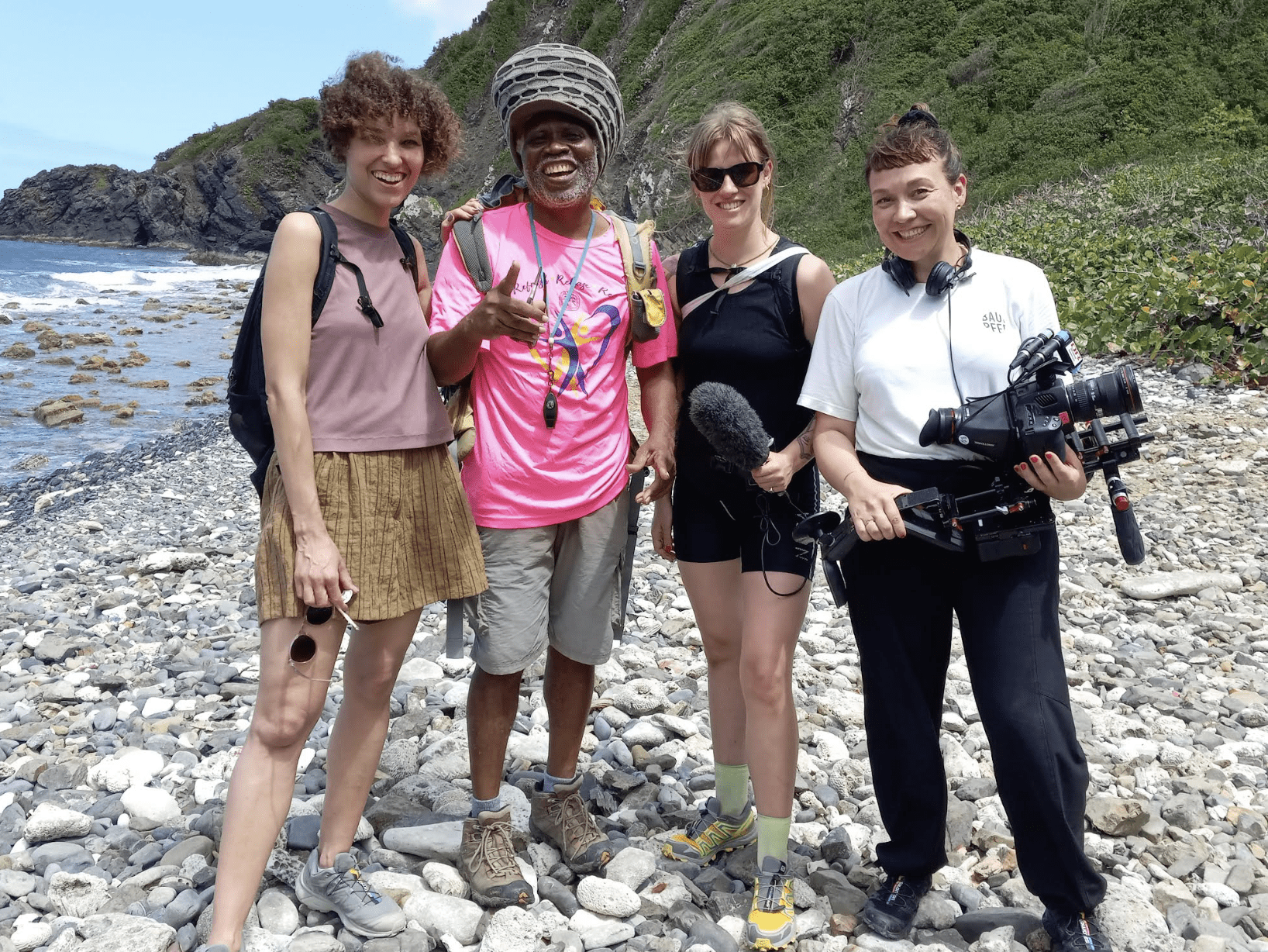 Nola, from left, Olasee, Anne and Michelle. These are the three journalists from Denmark that he worked with on the project to save Maroon Country. They are standing at Wills Bay, one of the many bays in Maroon Country on the Great Northwest of St. Croix. (Photo by Lisa Doward) 