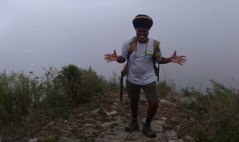 Olasee Davis on an early January morning at the summit of Mt. Eagle, where the fog covered the entire mountain. “Believe me, it was a spiritual experience of Mt. Eagle in the fog where runaway slaves once hid,” he said. (Photo courtesy Olasee Davis)
