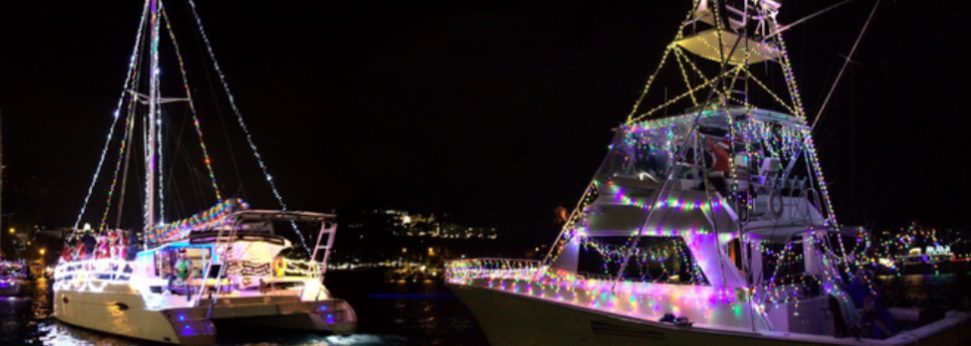 Boats decorated in colorful holiday lights make their way through the harbor during the annual Lighted Boat Parade, a highlight of Miracle on Main Street.Photo sourced from the St. Thomas-St. John Chamber of Commerce. 