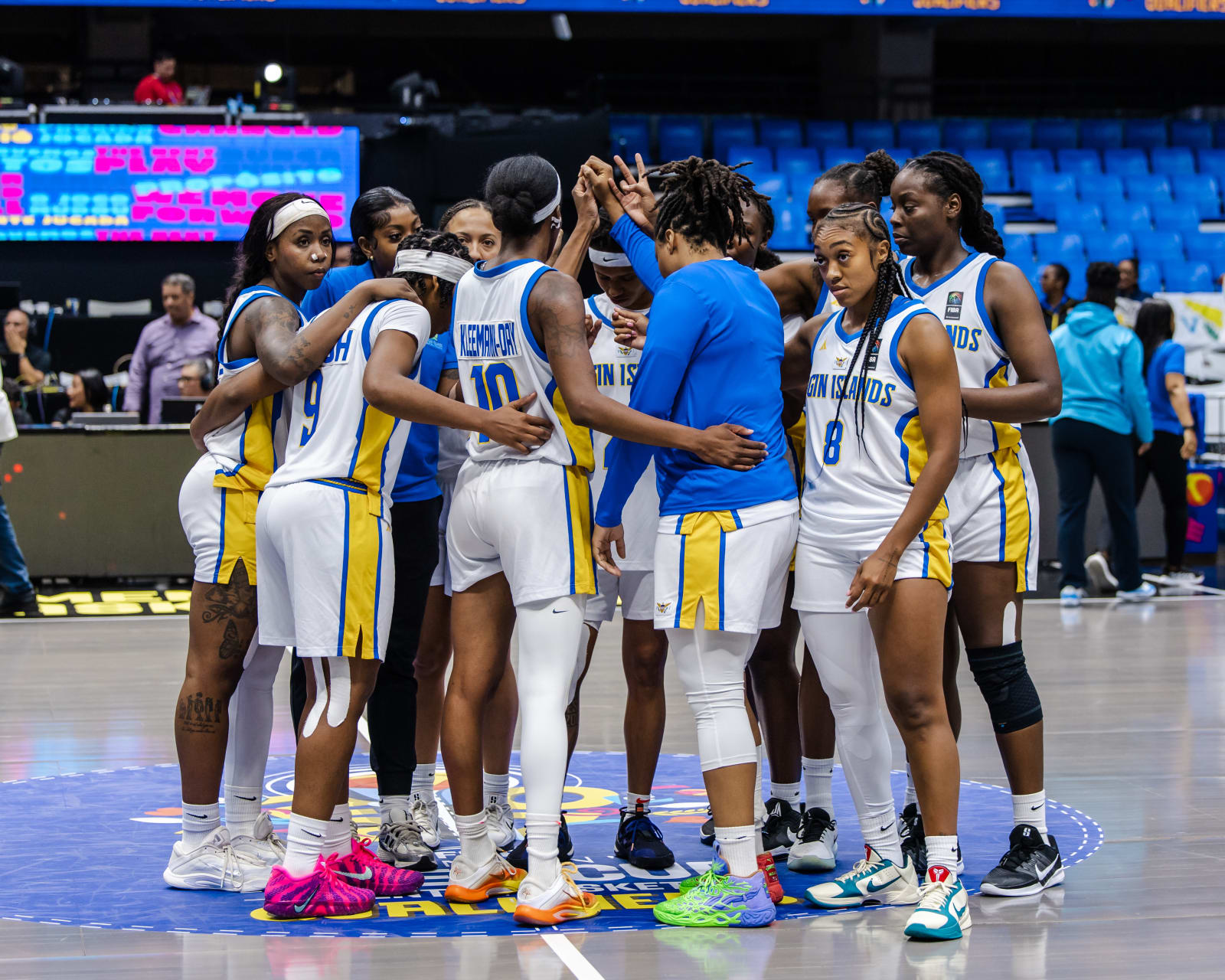 Team USVI huddles at center court at their quarter-final game against the Bahamas at the FIBA Women’s CentroBasket Qualifier in Managa, Nicaragua. (Submitted Photo)